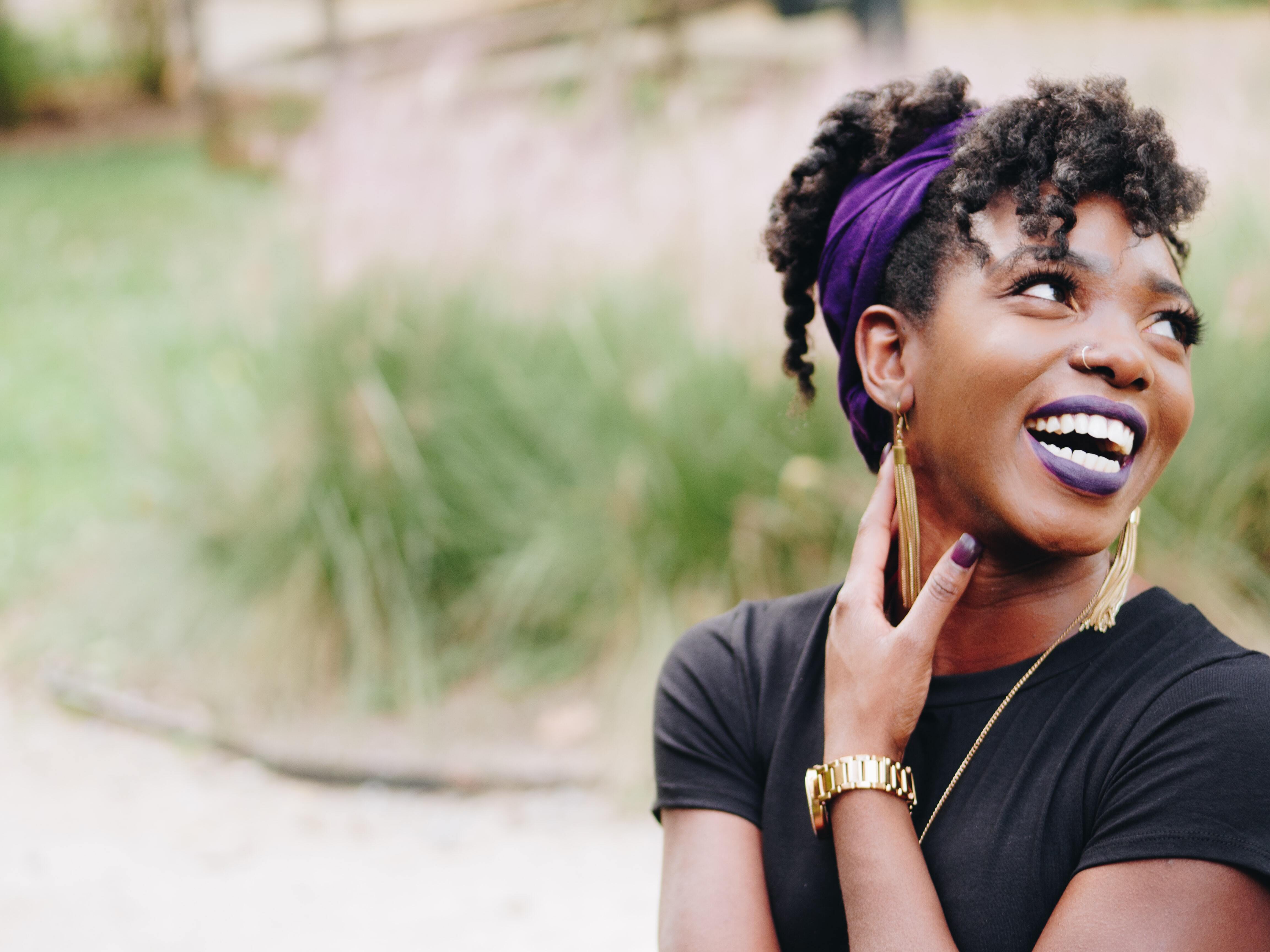 Woman laughing in park