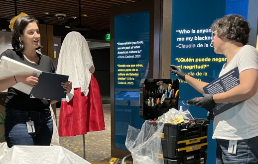 staff preparing the exhibition space