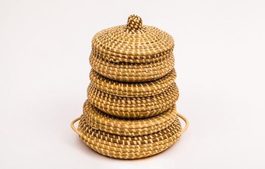 Stack of three coiled sewing baskets