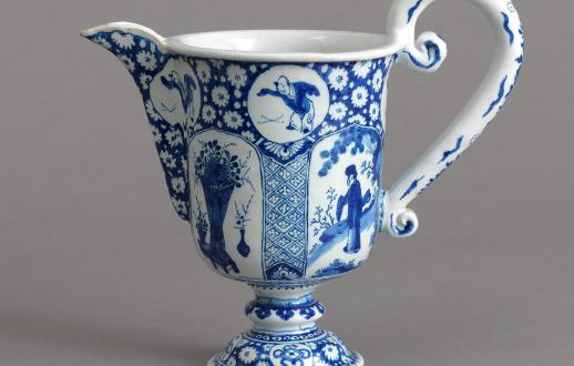 blue and white ewer with chinoiserie designs of figures and flower 