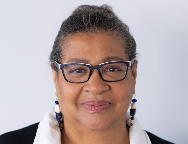 a Black woman wearing stylish eyeglass frames